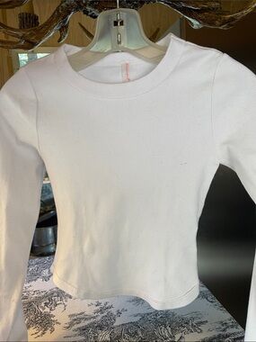 Free people movement stretchy white cropped top